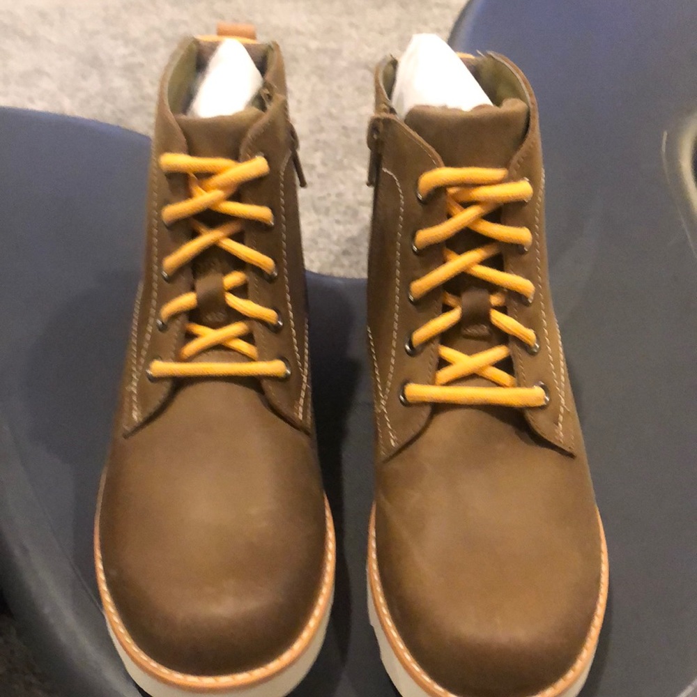 Never worn, Clark’s boots.